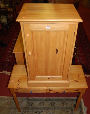 Lot 1323 - A modern pine single door side cupboard, width...