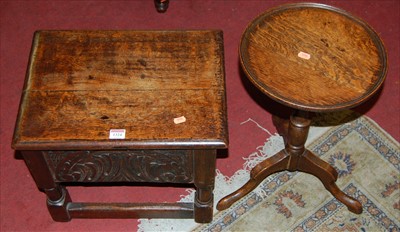 Lot 1324 - A relief carved and joined oak low hinge top...