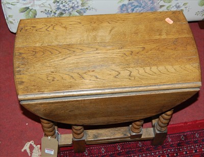 Lot 1325 - A small oak drop flap barleytwist low...