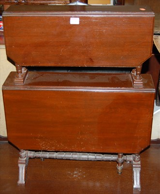 Lot 1328 - An Edwardian walnut double drop flap...