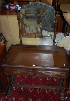 Lot 1329 - A contemporary moulded oak ledgeback...