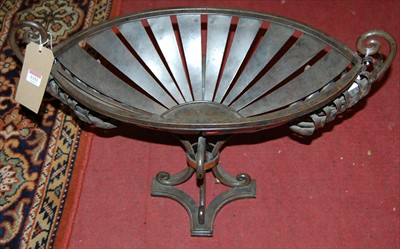 Lot 1331 - A contemporary wrought iron oval twin handled...