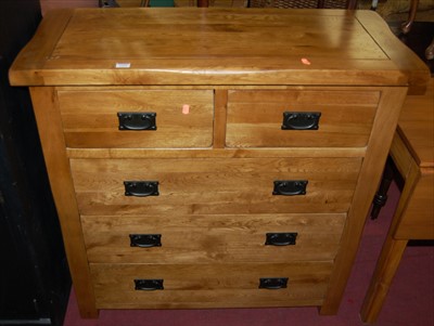 Lot 1339 - A contemporary joined light oak square front...
