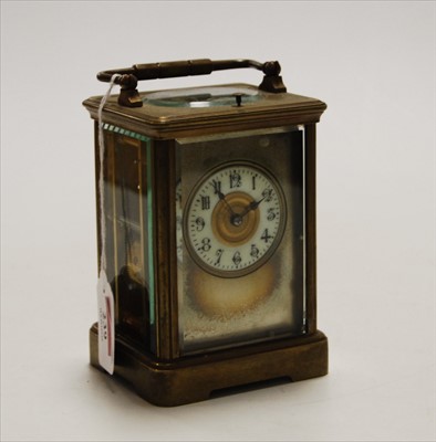 Lot 239 - An early 20th century lacquered brass cased...