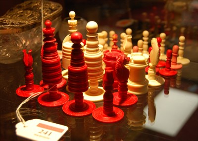 Lot 241 - A 19th century turned ivory part chess set,...