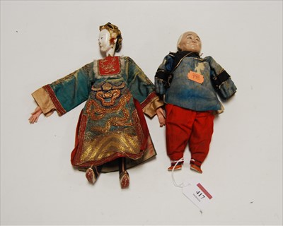 Lot 417 - An early 20th century Chinese composition doll,...