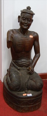 Lot 423 - A 20th century Asian carved teak? figure of a...
