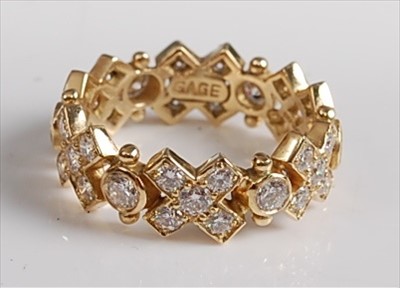 Lot 161 - A 1970s 18ct yellow gold diamond full hoop...