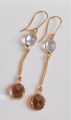 Lot 2186 - A pair of yellow metal, brown zircon and...