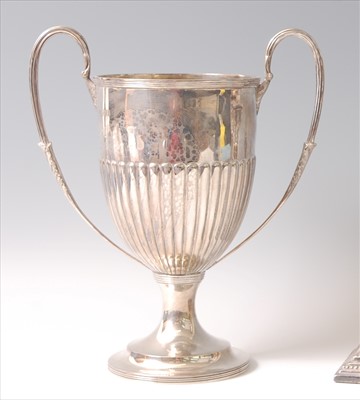 Lot 1148 - An Edwardian silver twin handled pedestal...