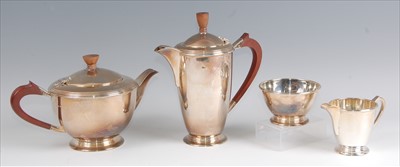 Lot 131 - An Art Deco style silver four-piece tea and...