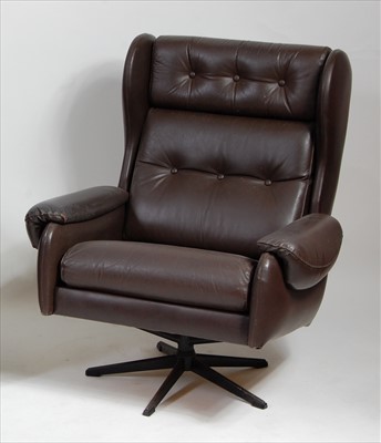 Lot 378 - A 1970s Danish chocolate brown vinyl buttoned...