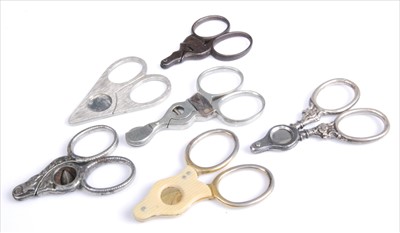 Lot 334 - A late Victorian silver handled scissor-action...
