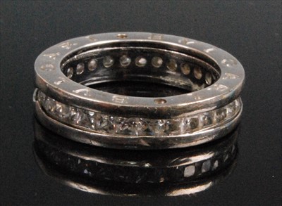 Lot 1214 - A silver full hoop eternity ring by Bulgari,...