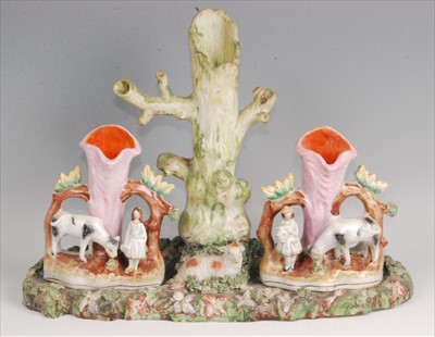 Lot 1118 - A large 19th century pearlware spill vase, the...