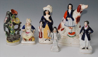 Lot 1120 - A Victorian Staffordshire spill vase, modelled...
