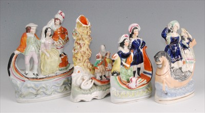 Lot 1121 - A Victorian Staffordshire figure modelled as...