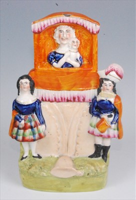 Lot 1124 - A 19th century Staffordshire flatback figure...