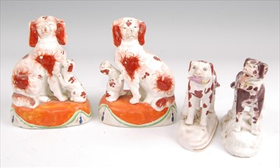 Lot 1130 - A pair of Victorian Staffordshire figures of...
