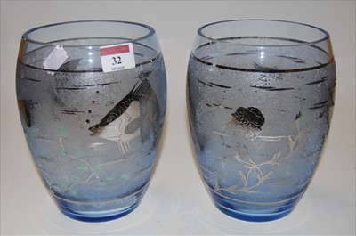 Lot 32 - A pair of blue tinted glass vases, of barrel...