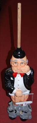 Lot 60 - A large painted resin novelty toilet roll...