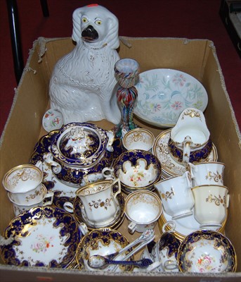 Lot 131 - A 19th century part tea service the centre...