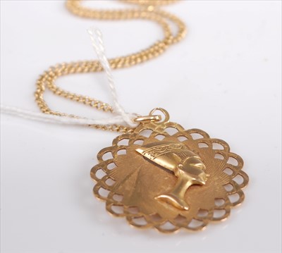 Lot 346 - A yellow metal double-sided pendant depicting...