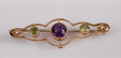 Lot 363 - An Edwardian 9ct gold amethyst, green peridot,...