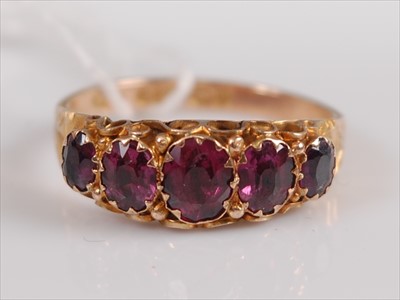 Lot 366 - A 9ct gold and oval cut amethyst set dress...