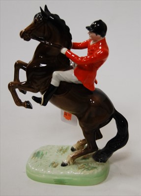Lot 175 - A Beswick figure of a huntsman on rearing...