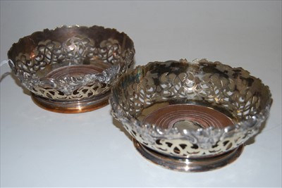 Lot 181 - A pair of Victorian Old Sheffield Plate bottle...