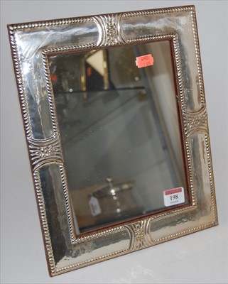 Lot 198 - A large modern white metal clad easel mirror,...