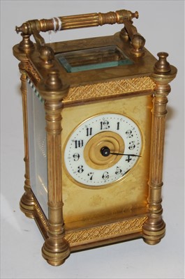 Lot 246 - A late 19th century gilt brass cased carriage...