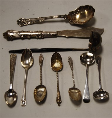 Lot 251 - Assorted silver flatwares to include a...