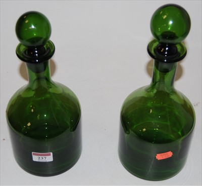 Lot 237 - A pair of mid-20th century green glass...