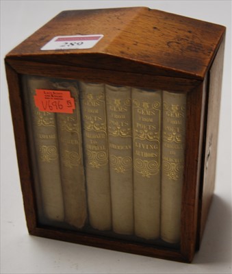 Lot 289 - A small Victorian mahogany cabinet, the glazed...