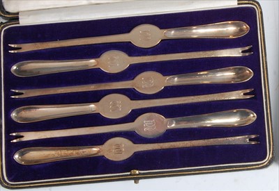 Lot 137 - A set of six Art Deco silver lobster picks,...