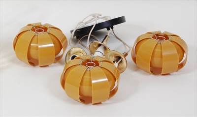 Lot 192 - A 1970s amber coloured plastic three-branch...