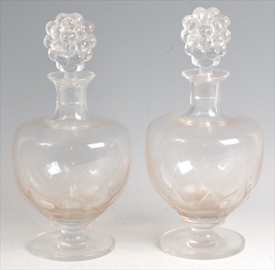 Lot 65 - A pair of 1920s Lalique crystal glass pedestal...