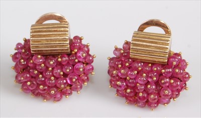 Lot 166 - A pair of yellow metal 1960s style multi-bead...
