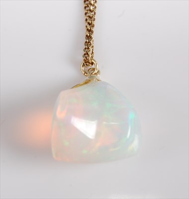 Lot 1224 - A yellow metal abstract opal pendant, attached...