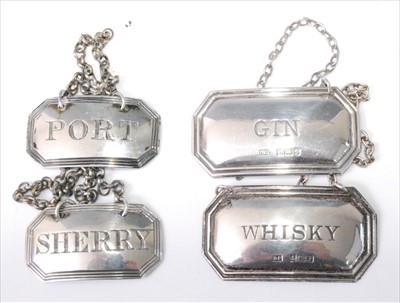 Lot 1176 - A pair of George IV silver decanter collars,...