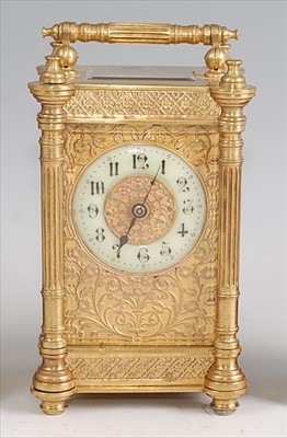 Lot 1447 - A circa 1900 French lacquered brass carriage...