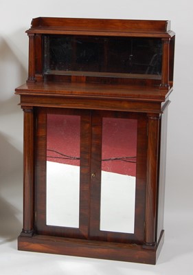 Lot 1120 - A late Regency rosewood chiffonier, the raised...