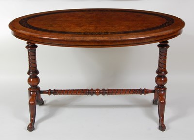 Lot 1288 - A Victorian figured walnut oval centre table,...
