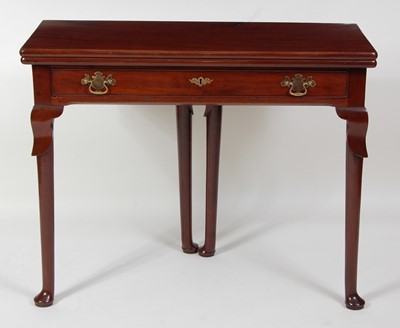 Lot 1278 - A George II mahogany tea table, having a...
