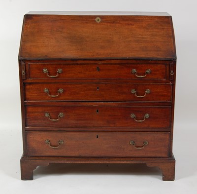 Lot 1241 - A George III mahogany writing bureau, the...