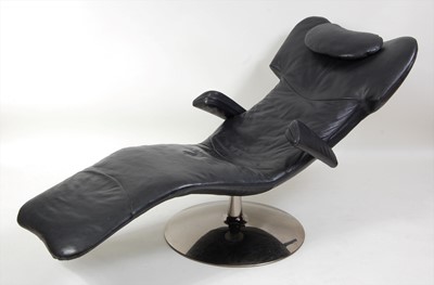 Lot 1332 - A contemporary Natuzzi black leather...