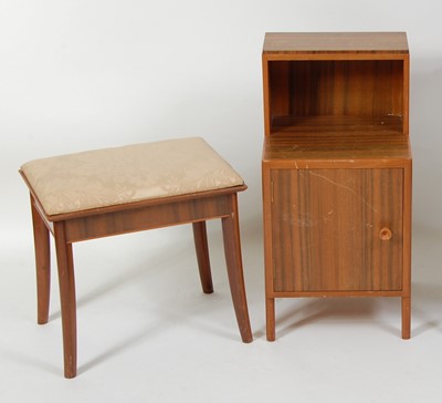 Lot 1221 - Gordon Russell (1892-1980) - a 1950s walnut...