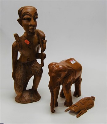 Lot 43 - A large carved tribal style figure of a man...